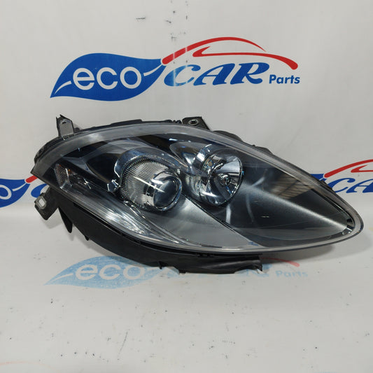 Fanale anteriore dx Fiat Bravo 2010 fondo scuro freccia bianca ecoAC3291