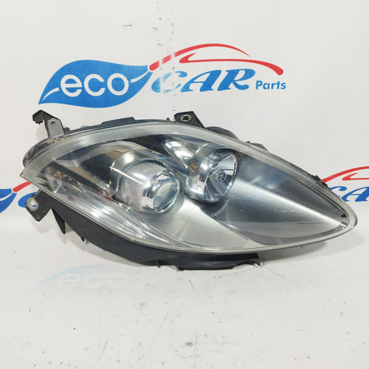 Fanale anteriore dx Fiat Bravo 2010 freccia bianca con fondo scuro ecoAC5049
