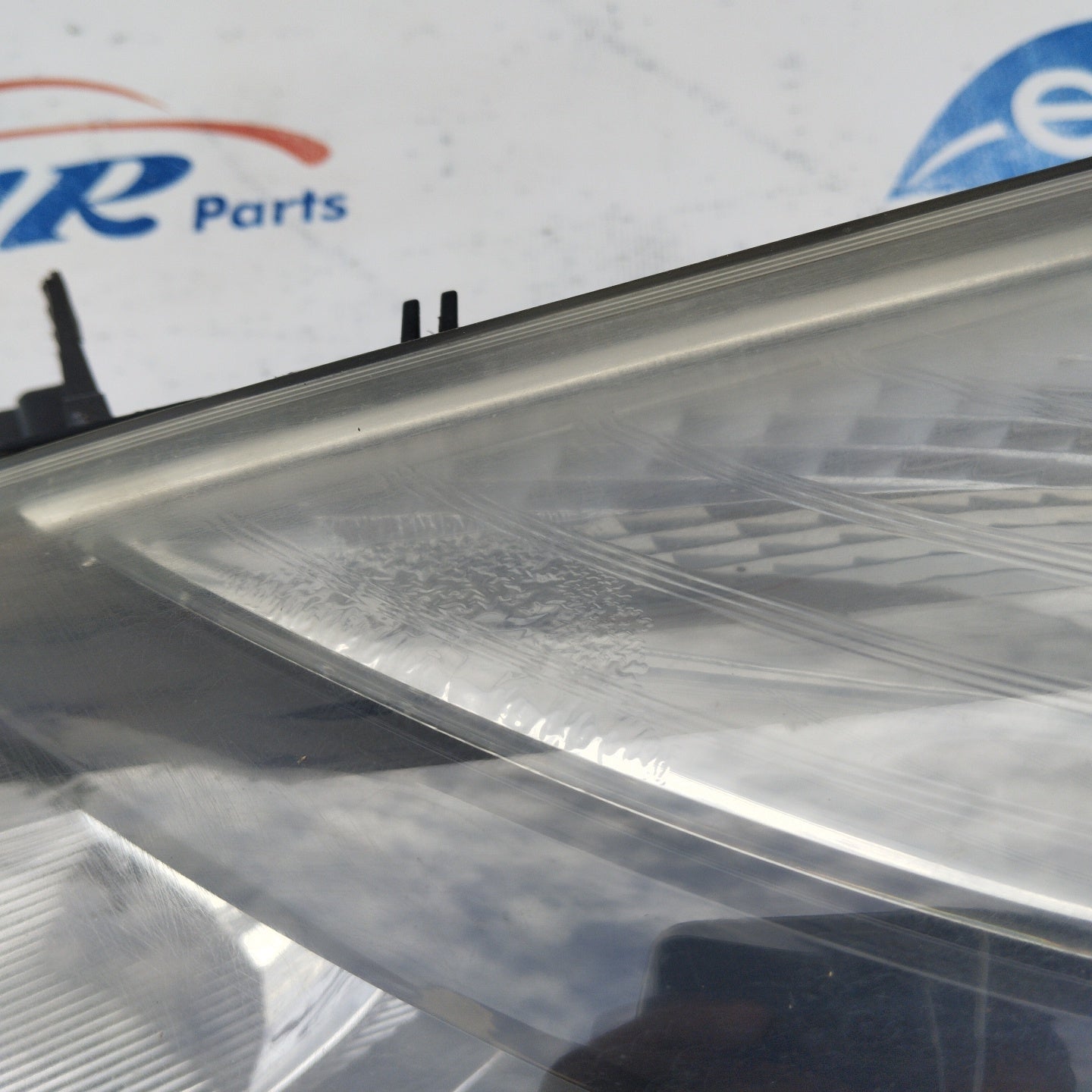 Left front light Renault Clio 2008 black background DEPO ecoAG3092