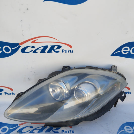 Fanale anteriore sx Fiat Bravo Fondo scuro freccia bianca ecoAG3102