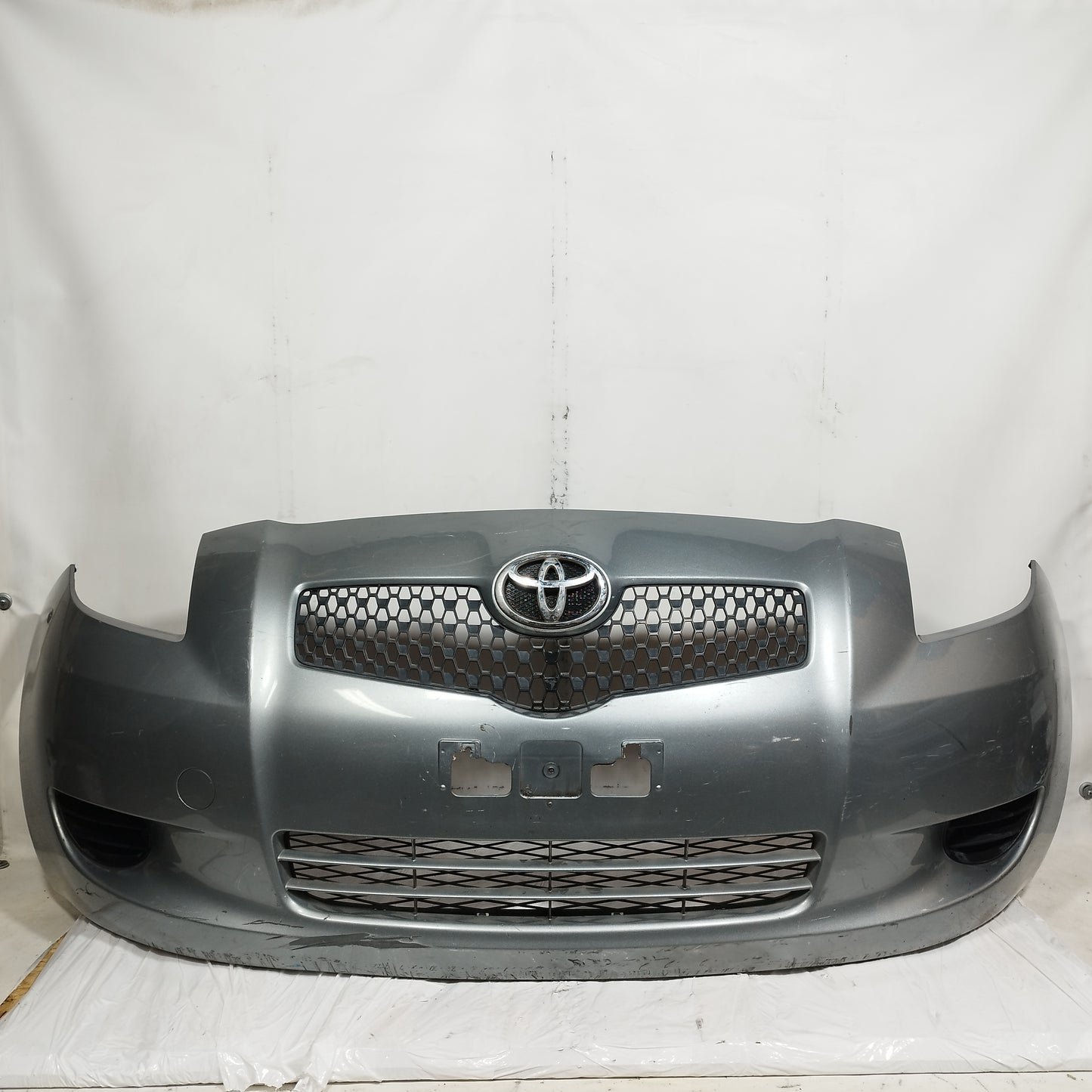 Paraurti anteriore grigio Toyota Yaris II (XP90) 2006-2008 ecoAC15190