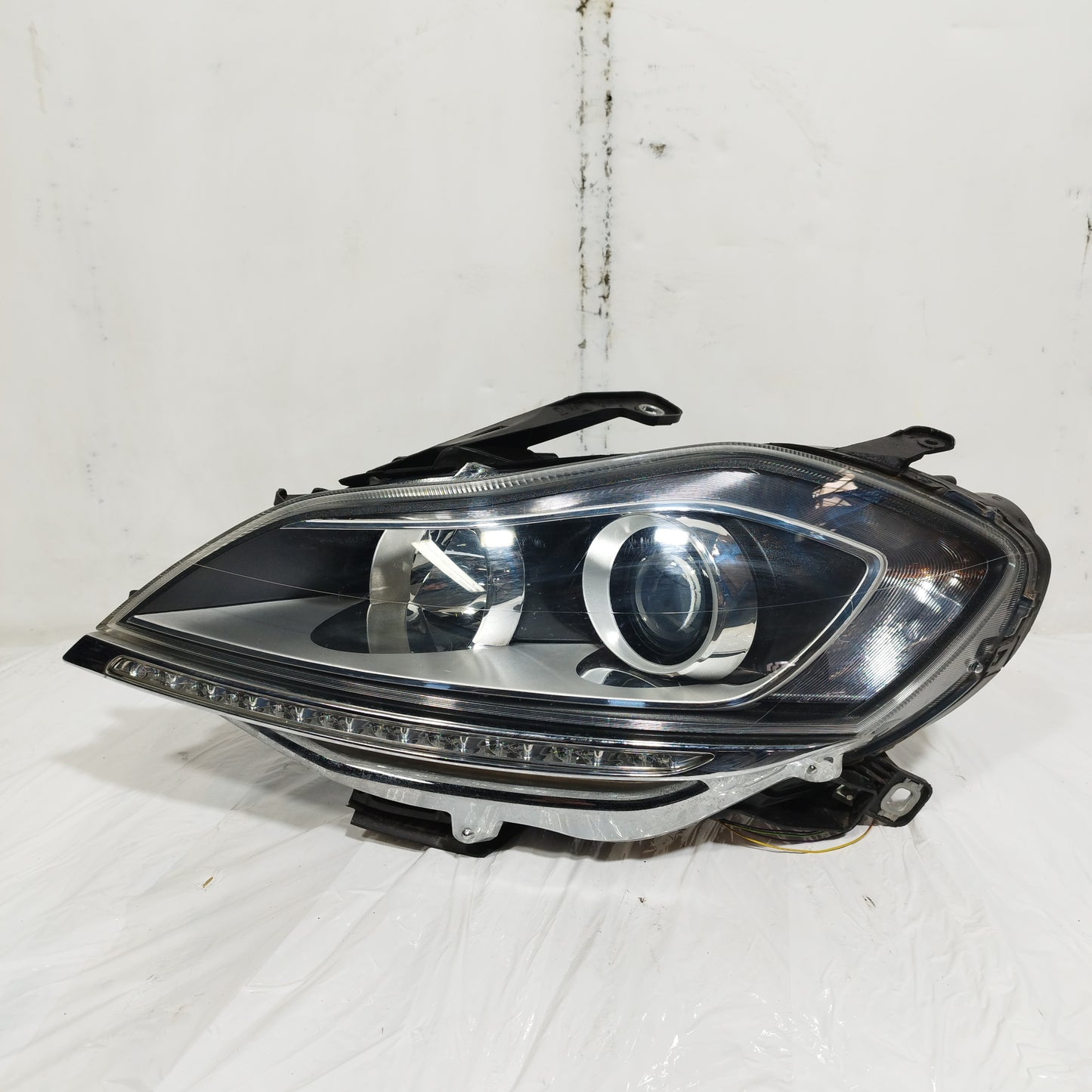 Fanale anteriore sx Lancia Delta III serie (844) 2008-2014 ecoAC15025