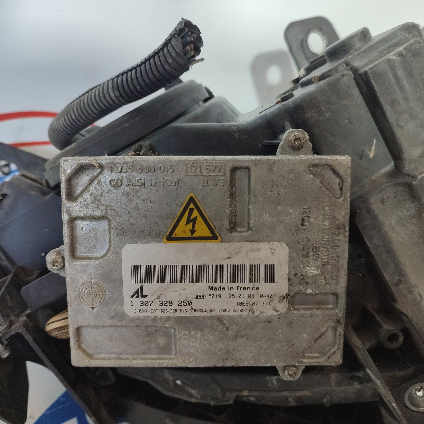 Fanale anteriore sx Fiat Bravo 2008 xenon fondo nero freccia gialla ecoAG1189