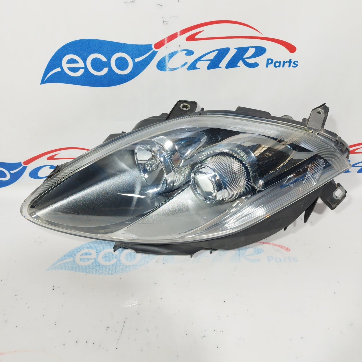 Fanale anteriore sx Fiat Bravo 2010 fondo scuro freccia bianca ecoAC3290