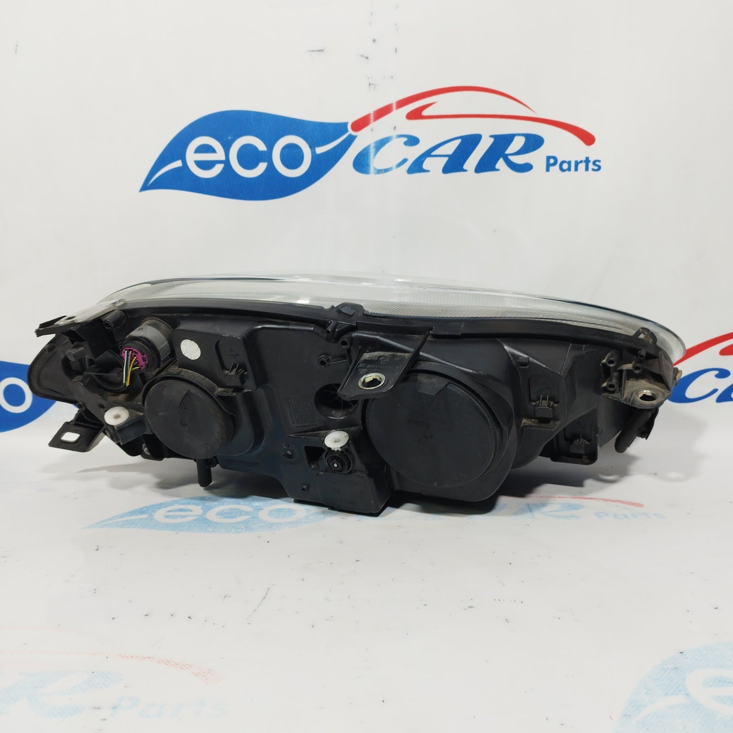 Fanale anteriore sx Fiat Bravo 2010 fondo scuro freccia bianca ecoAC3290