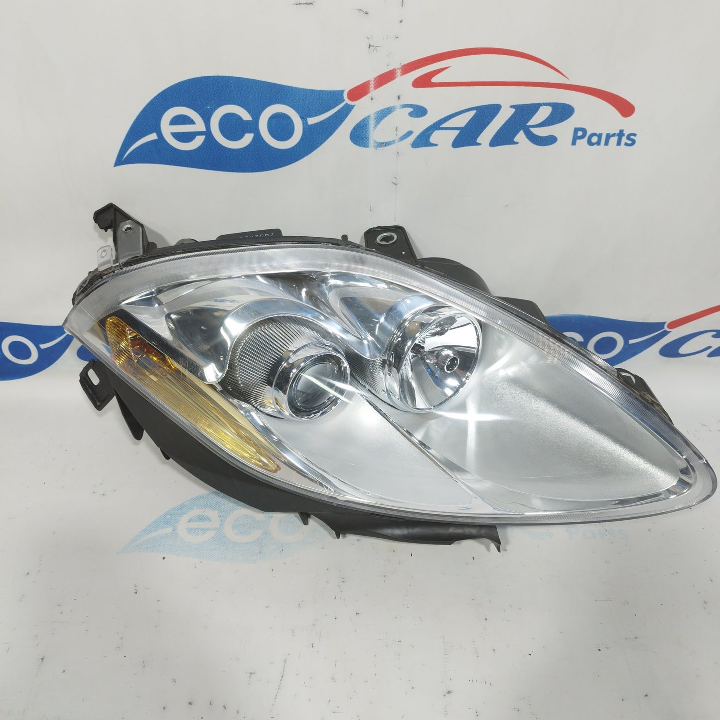 Fanale anteriore dx Fiat Bravo 2008 fondo chiaro e freccia gialla ecoAC3782