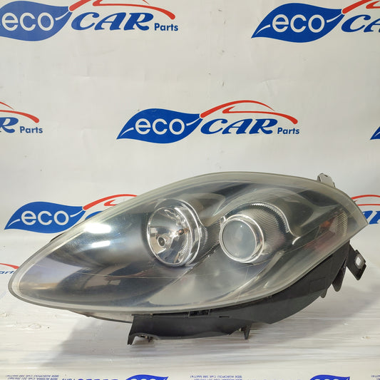 Fanale anteriore sx Fiat bravo fondo nero freccia bianca ecoAG1727