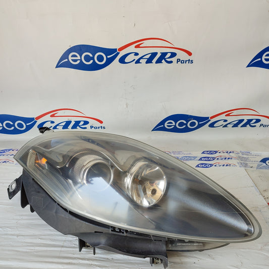 Fanale anteriore dx Fiat Bravo 2008 fondo scuro freccia bianca ecoAG1835