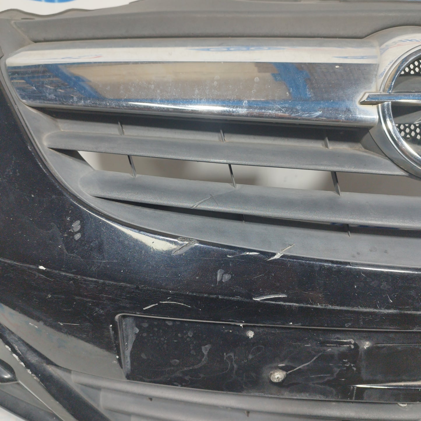 Black front bumper Opel Corsa D 2006 ecoAC4393