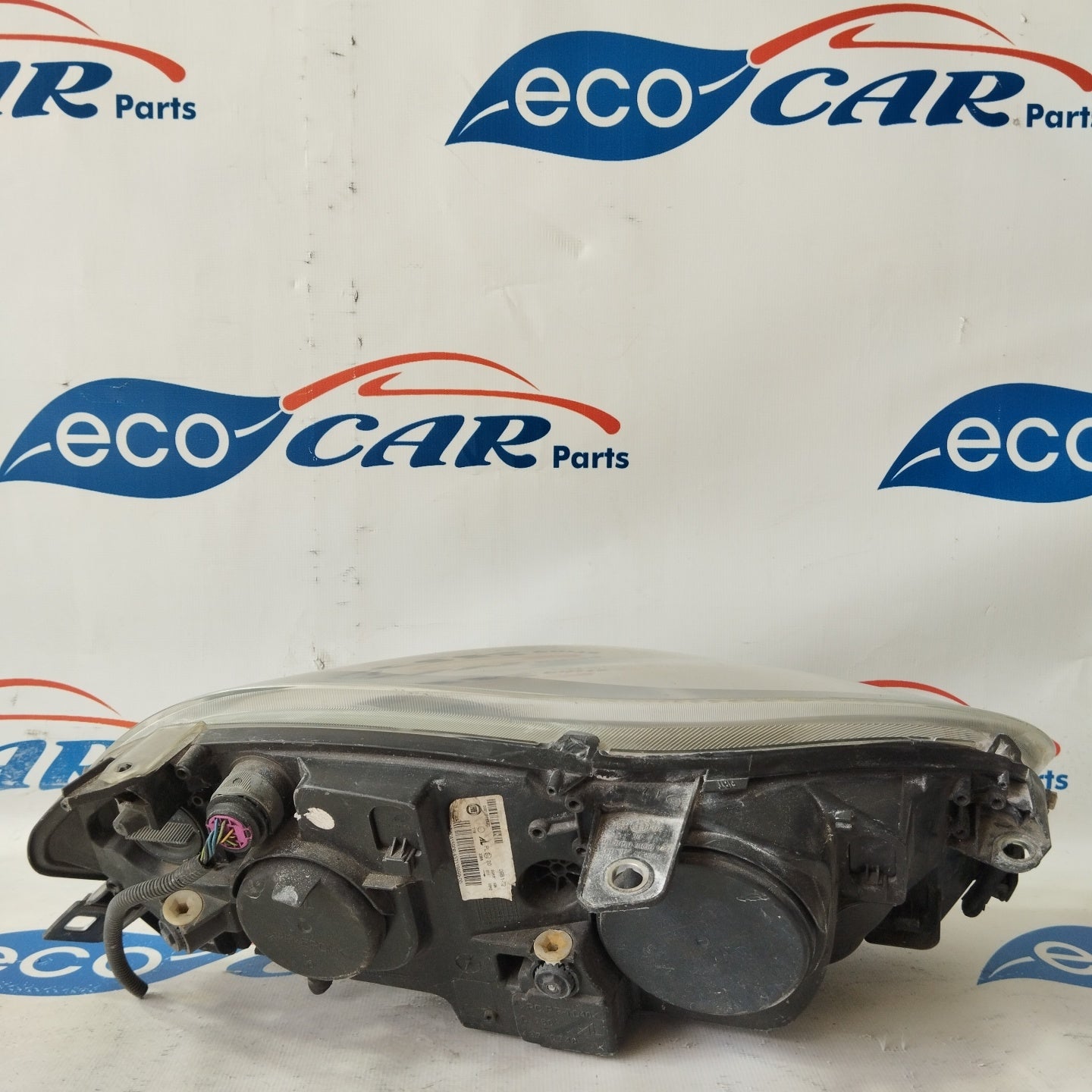 Fanale anteriore sx Fiat Bravo 2008 fondo scuro freccia bianca ecoAG2891