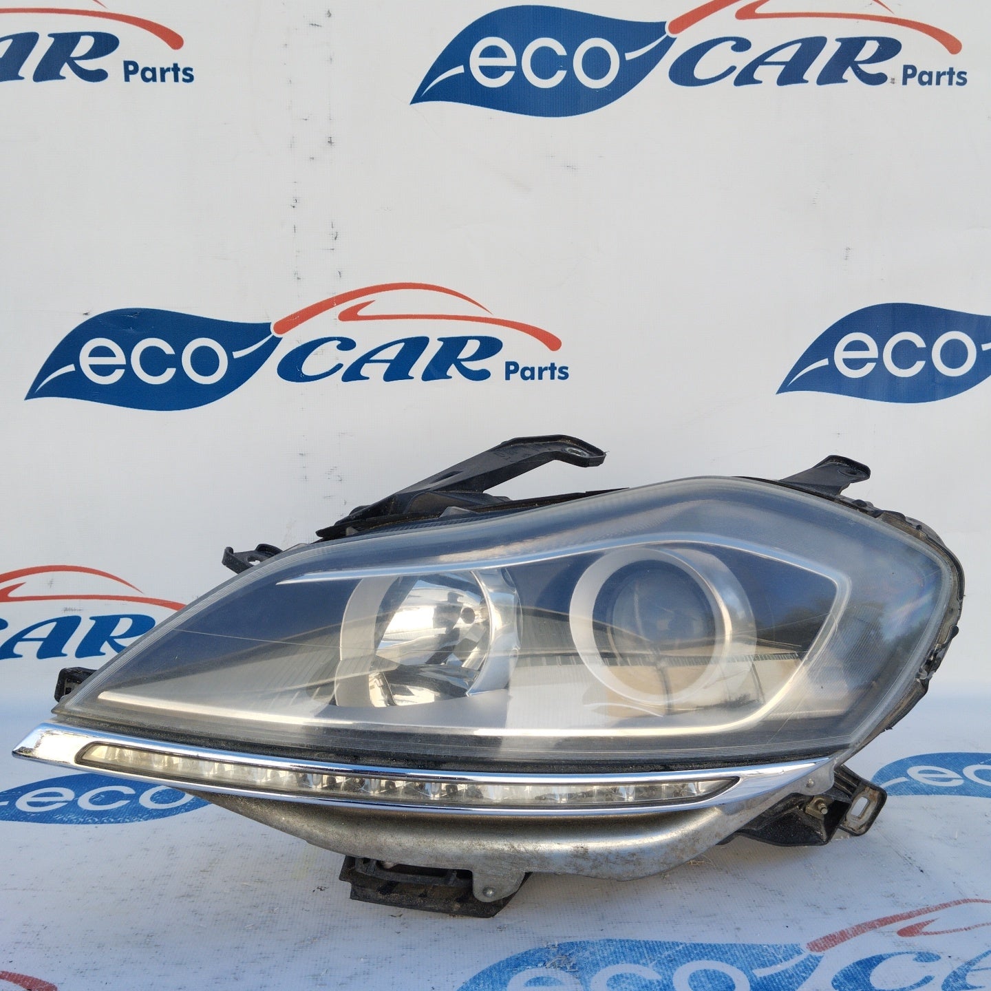 Left Xenon front light Lancia Delta 2010 ecoAG3095