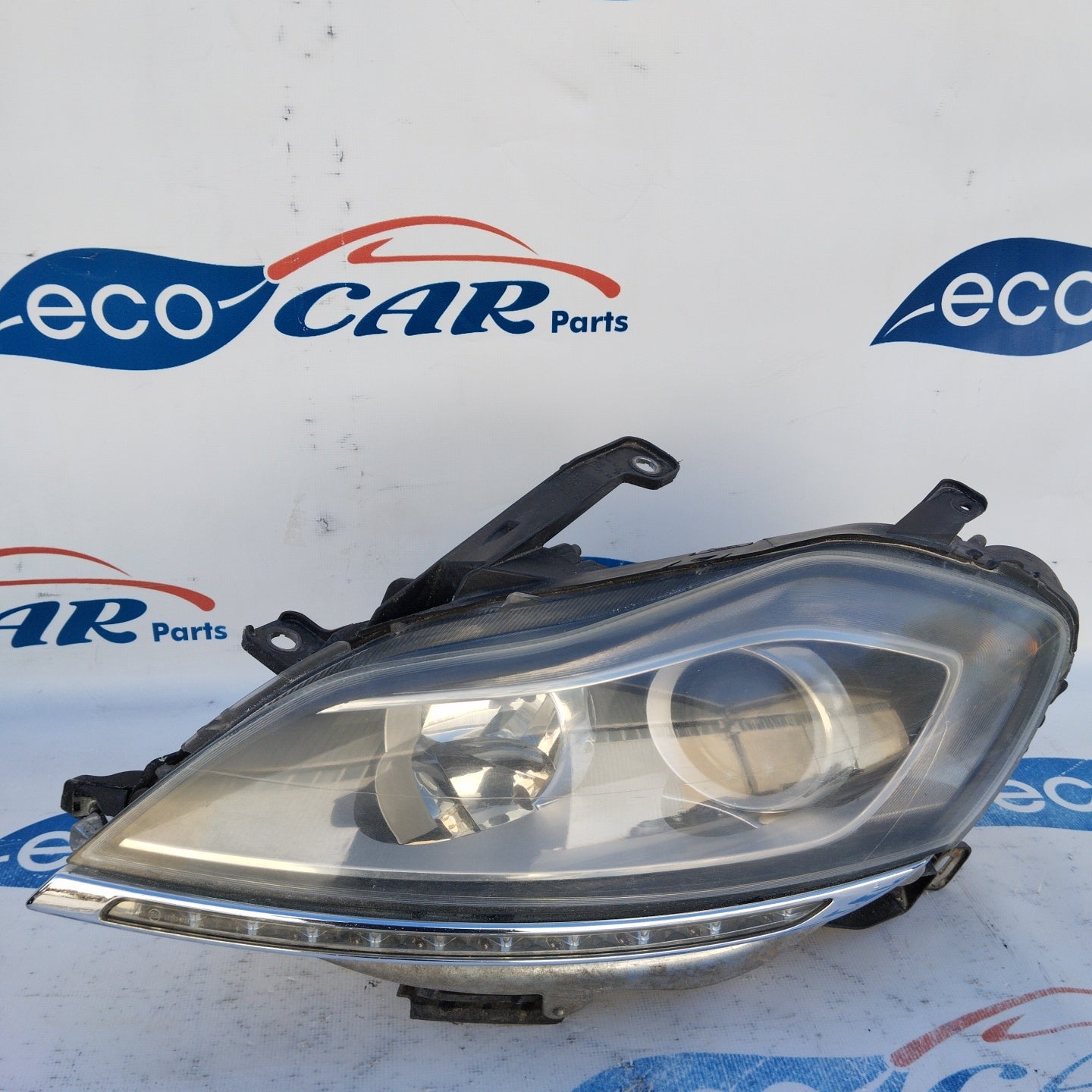 Left Xenon front light Lancia Delta 2010 ecoAG3095