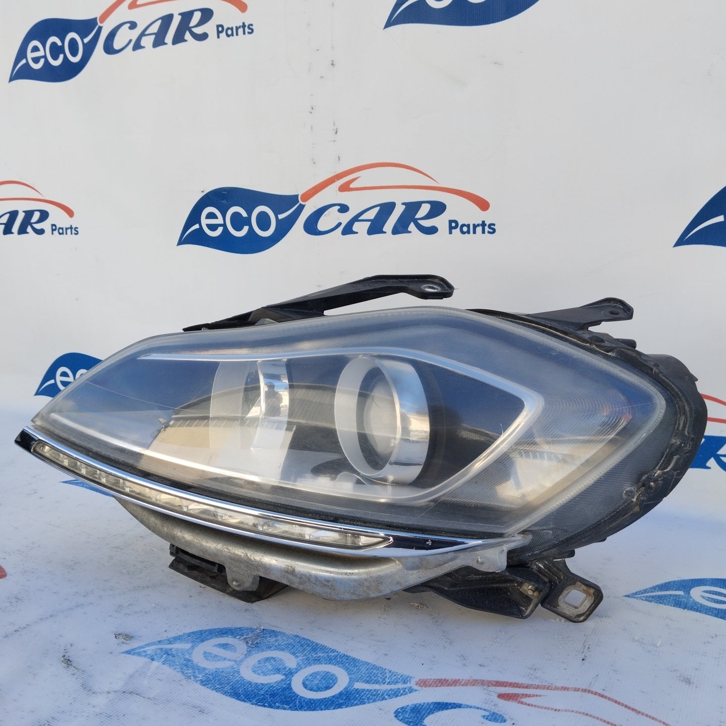 Left Xenon front light Lancia Delta 2010 ecoAG3095