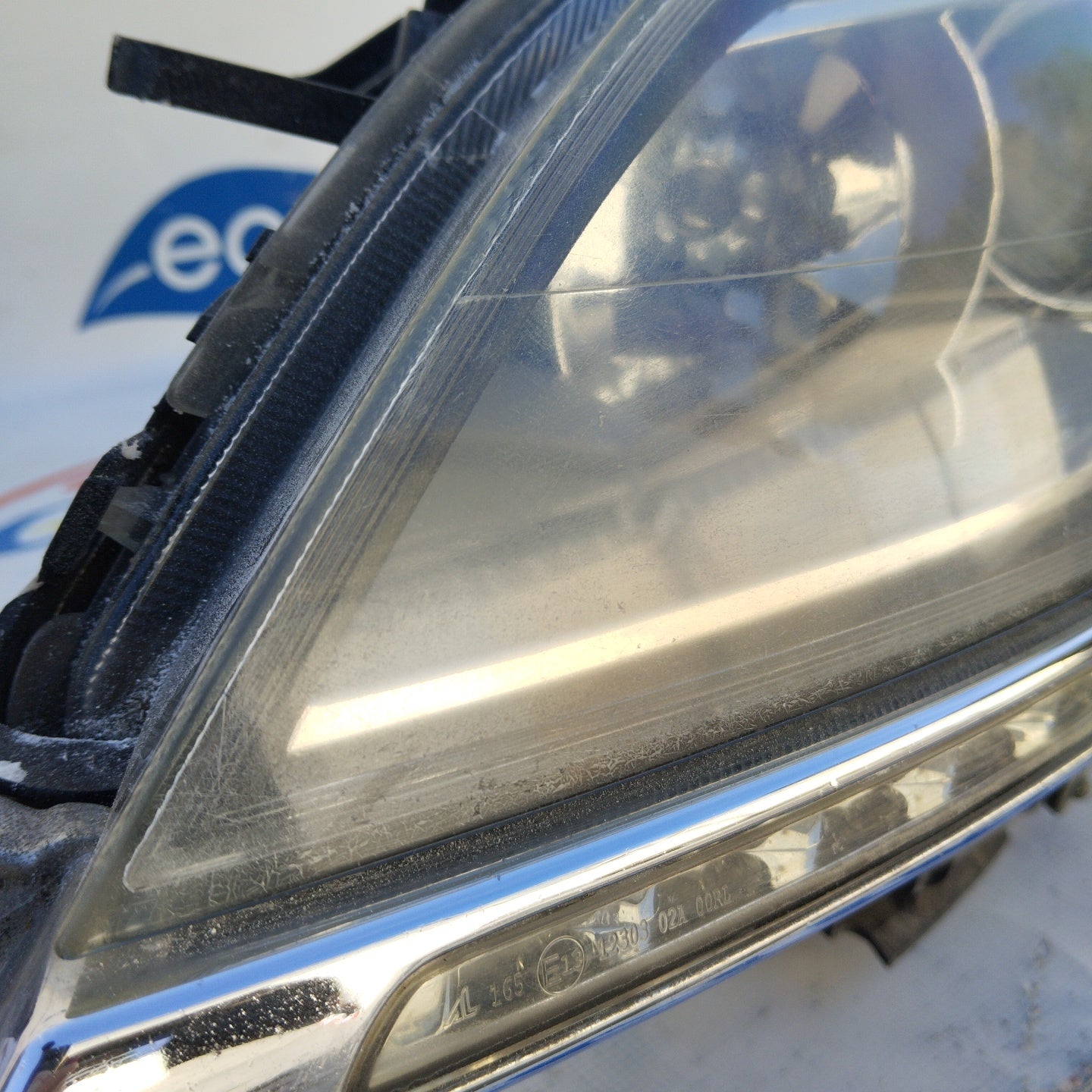 Left Xenon front light Lancia Delta 2010 ecoAG3095