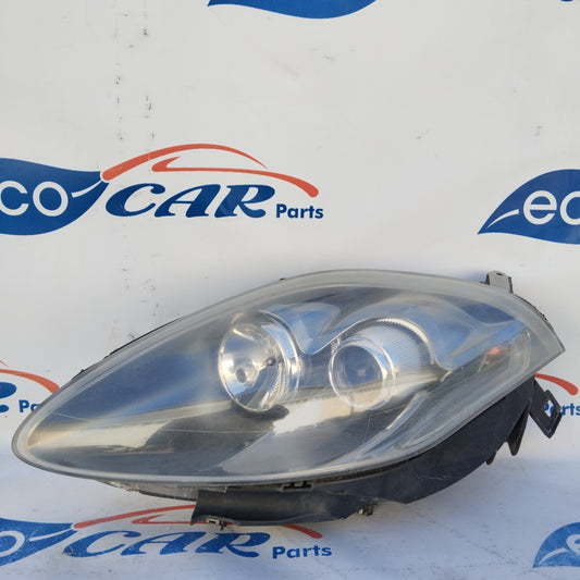 Fanale anteriore sx Fiat Bravo Fondo scuro freccia bianca ecoAG3102