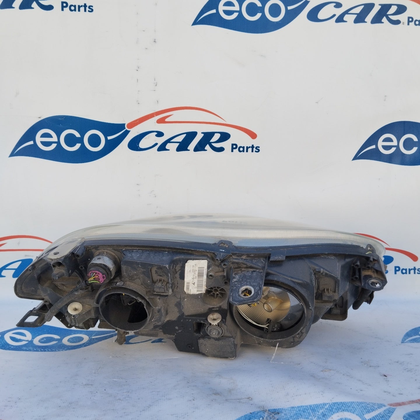 Fanale anteriore sx Fiat Bravo Fondo scuro freccia bianca ecoAG3102