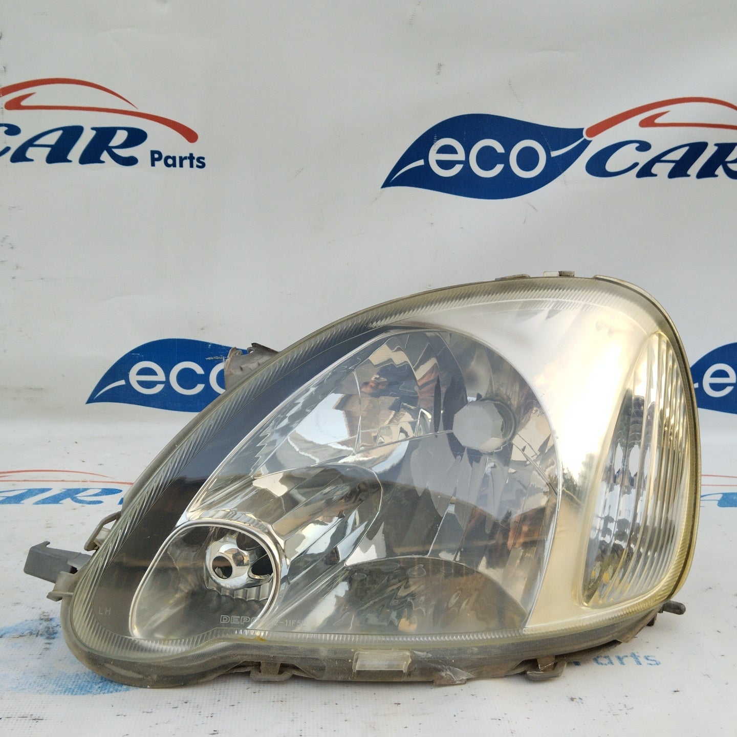 Left front light Toyota Yaris 2005 (DEPO) ecoAG3395