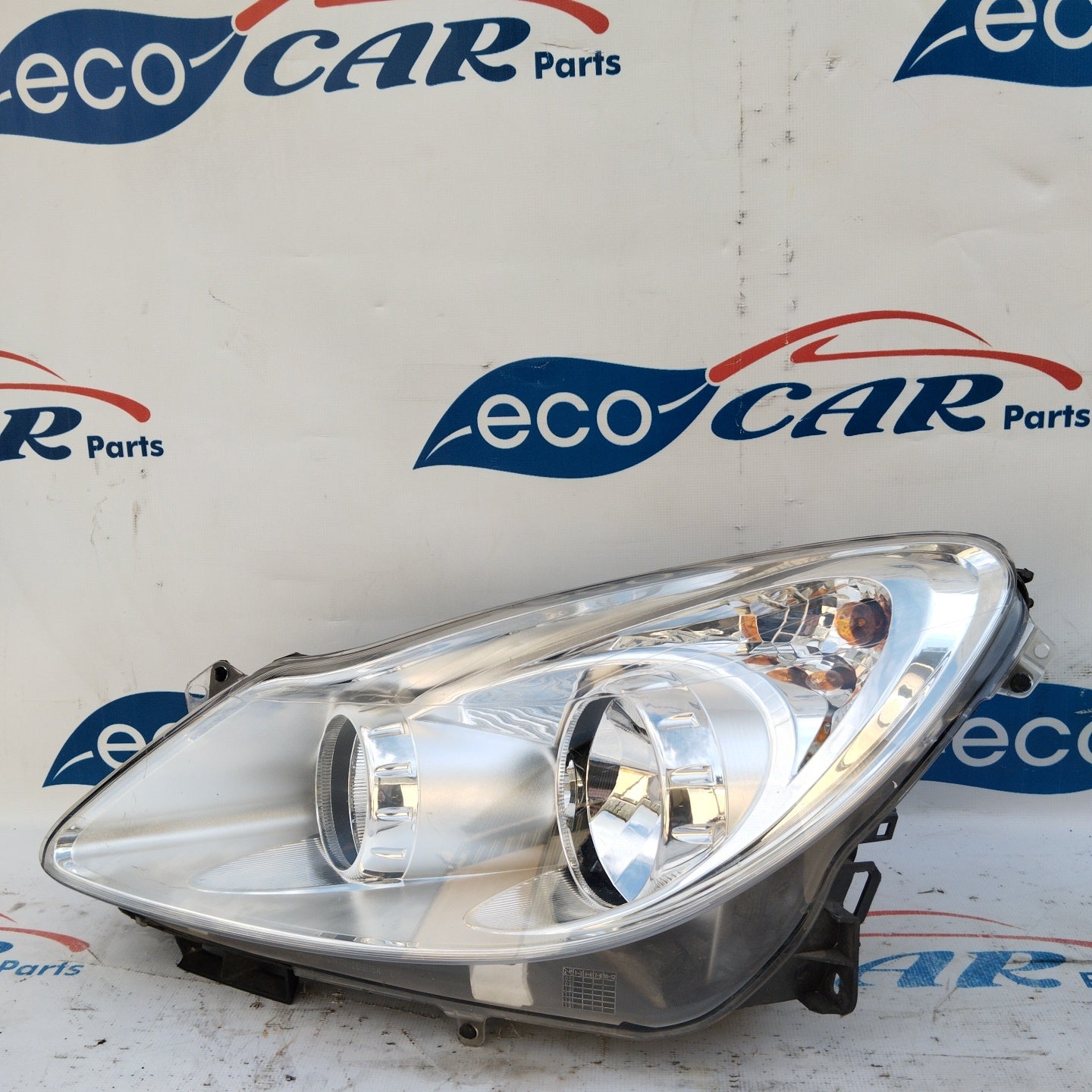 Fanale anteriore sx Opel Corsa D fondo chiaro ecoAG3574
