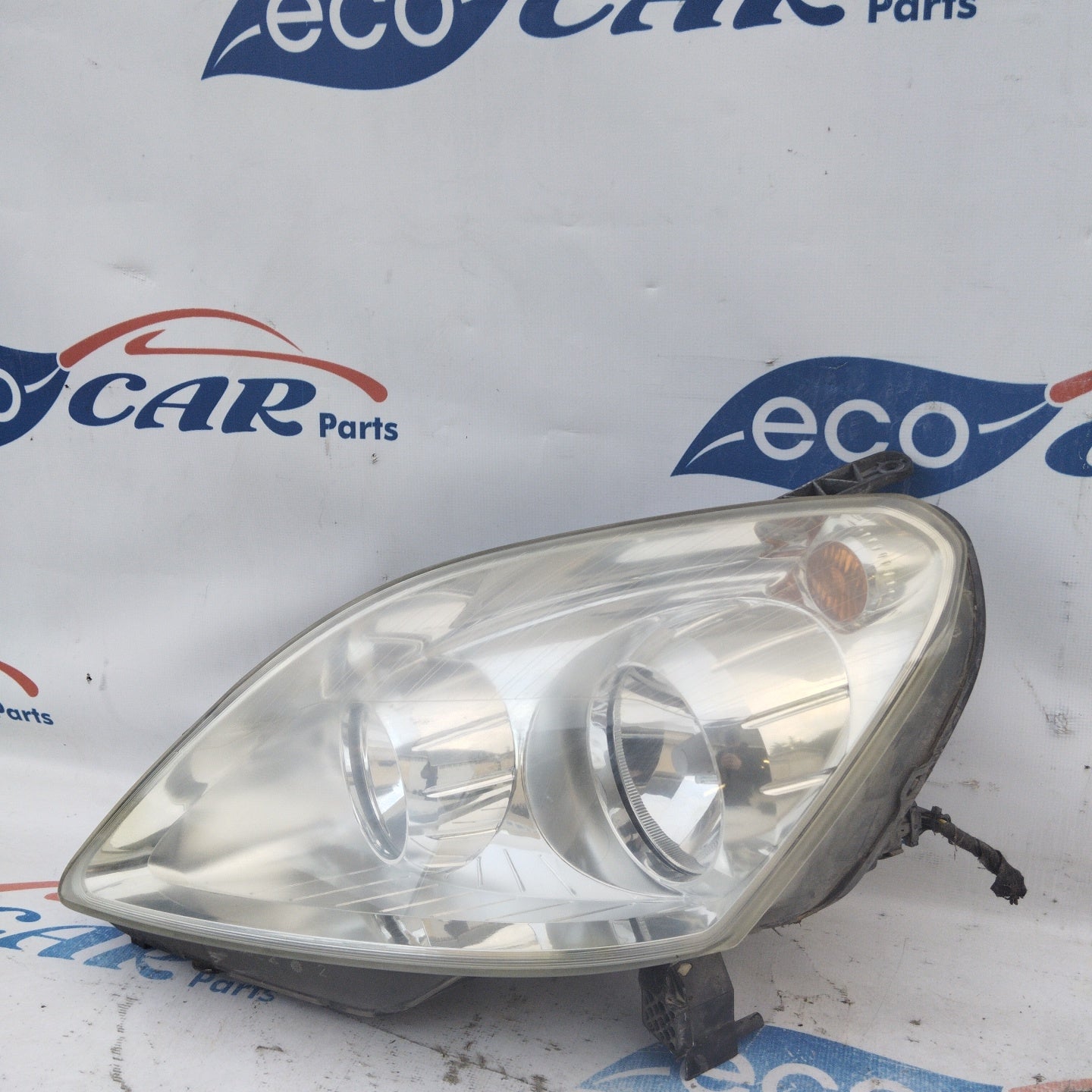 Fanale anteriore sx Opel Zafira B fondo chiaro ecoAG3853