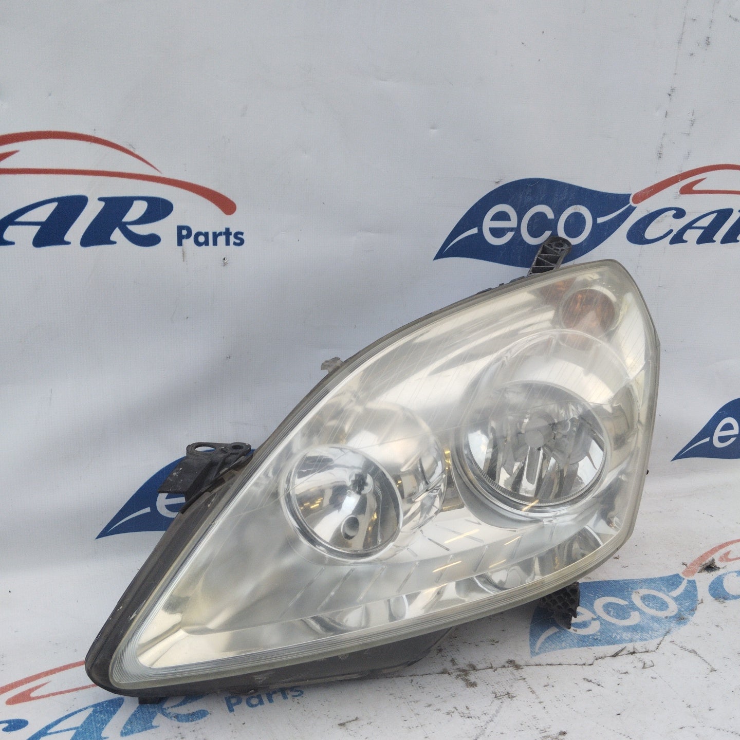 Fanale anteriore sx Opel Zafira B fondo chiaro ecoAG3853