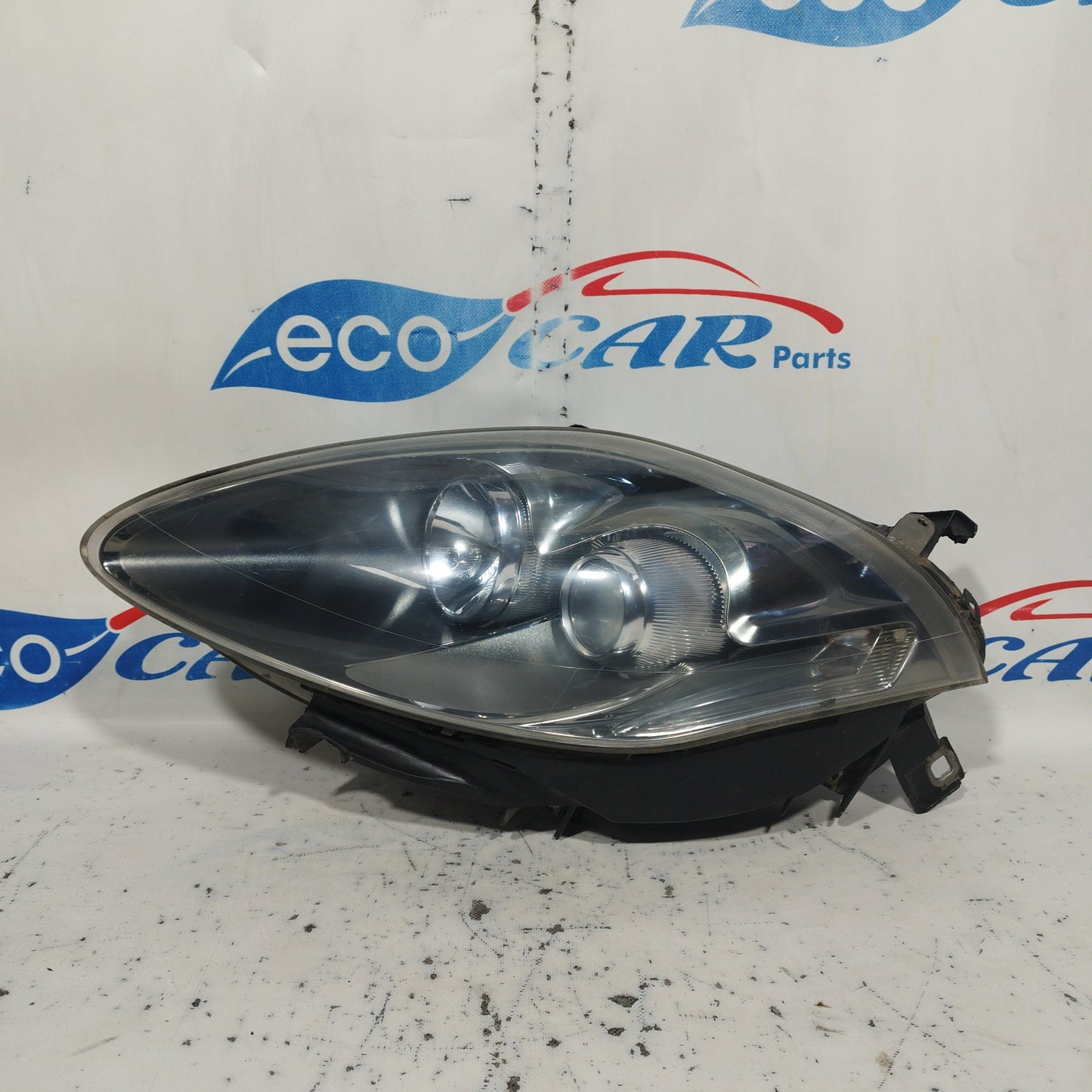 Fanale anteriore sx Fiat Bravo 2010 Fondo scuro e freccia bianca ecoAC6750