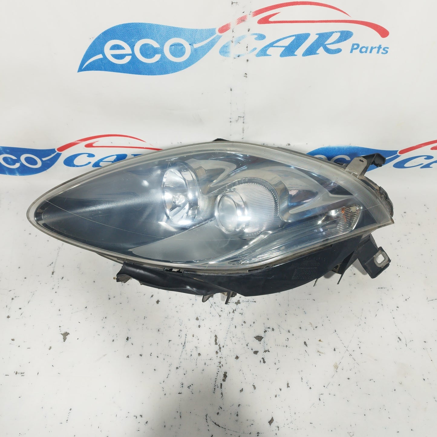 Fanale anteriore sx Fiat Bravo 2010 Fondo scuro e freccia bianca ecoAC6750