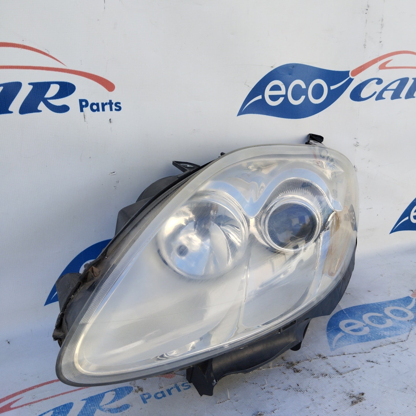Fanale anteriore sx Fiat Bravo 2007 Fondo Chiaro freccia gialla ecoAG4372