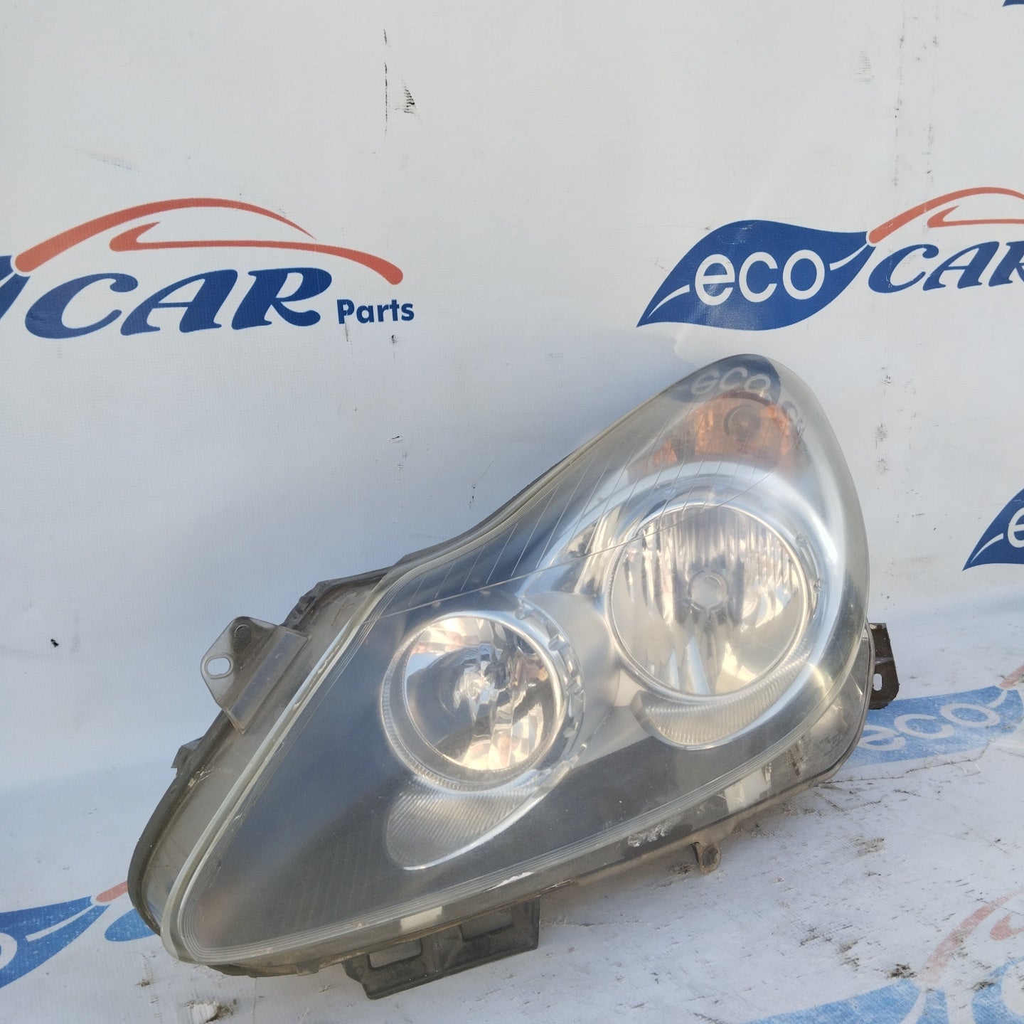 Fanale anteriore sx Opel Corsa D fondo scuro ecoAG4378
