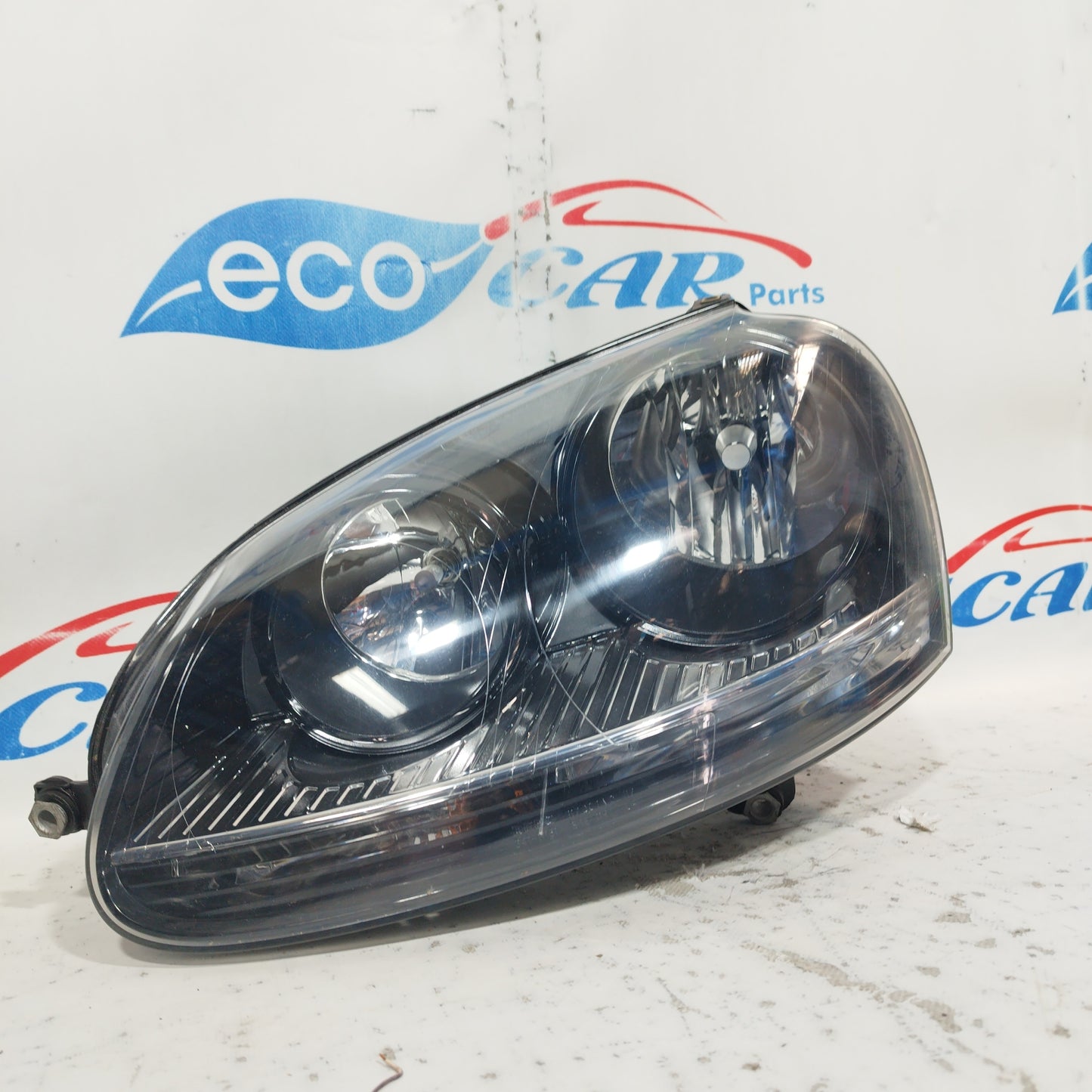 Volkswagen Golf V 2006 DEPO ecoAC7400 linker Frontscheinwerfer