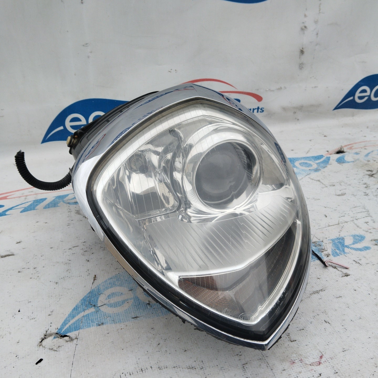 Left Xenon front light Lancia Thesis 2005 ecoAG4643