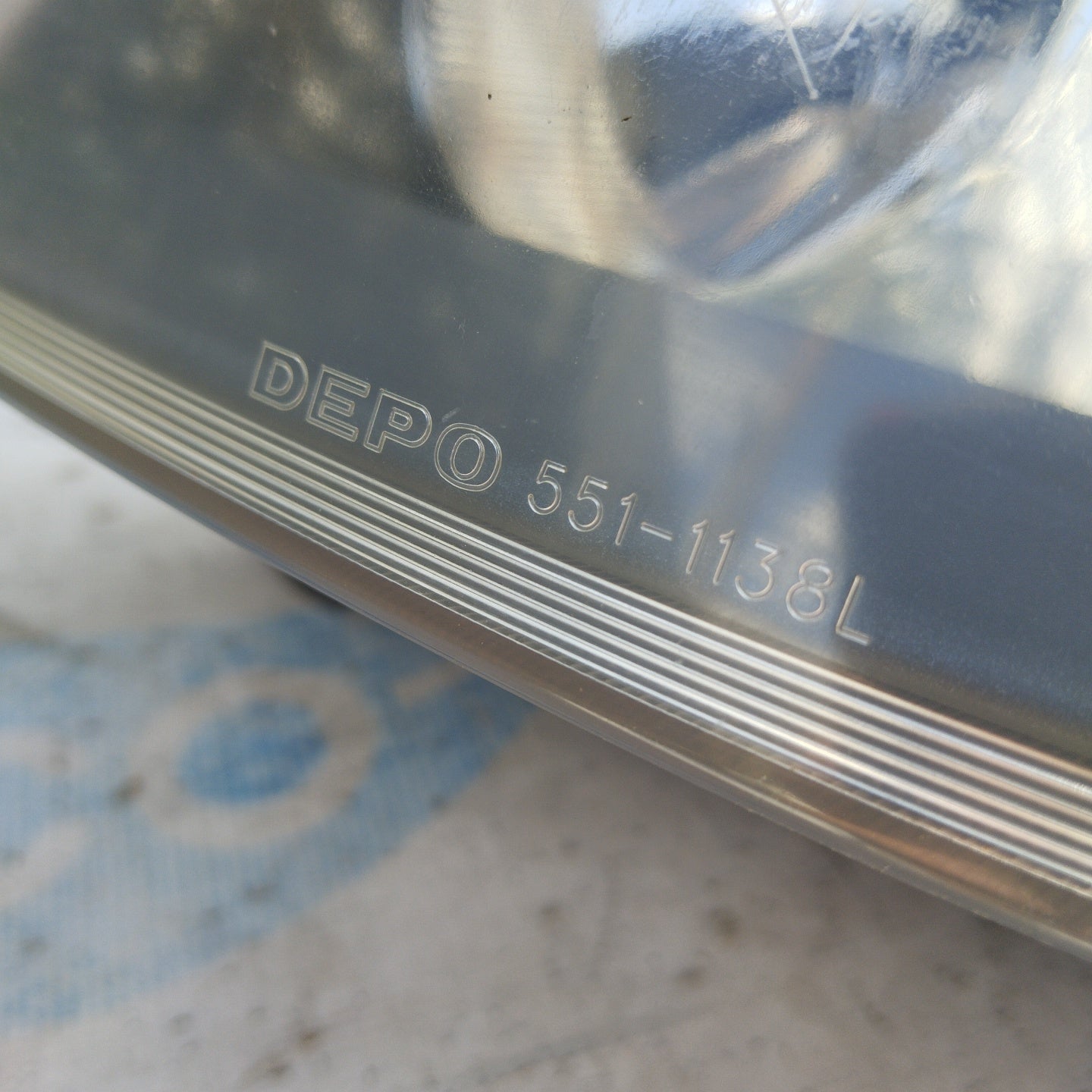 Left front light Renault Clio 2003 gray background (DEPO) ecoAG4851