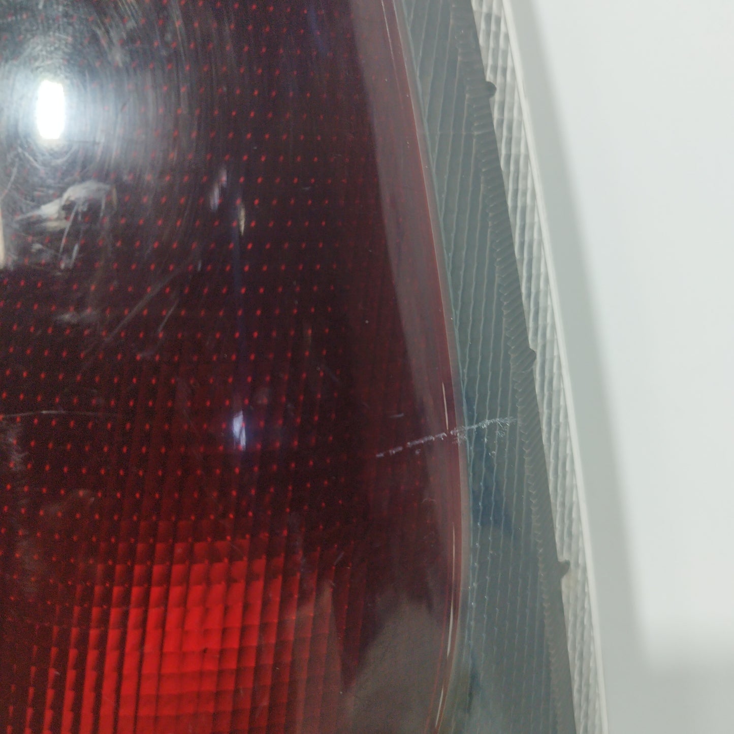 Toyota Yaris Verso 2000 getönte linke Rückleuchte ecoAC8024