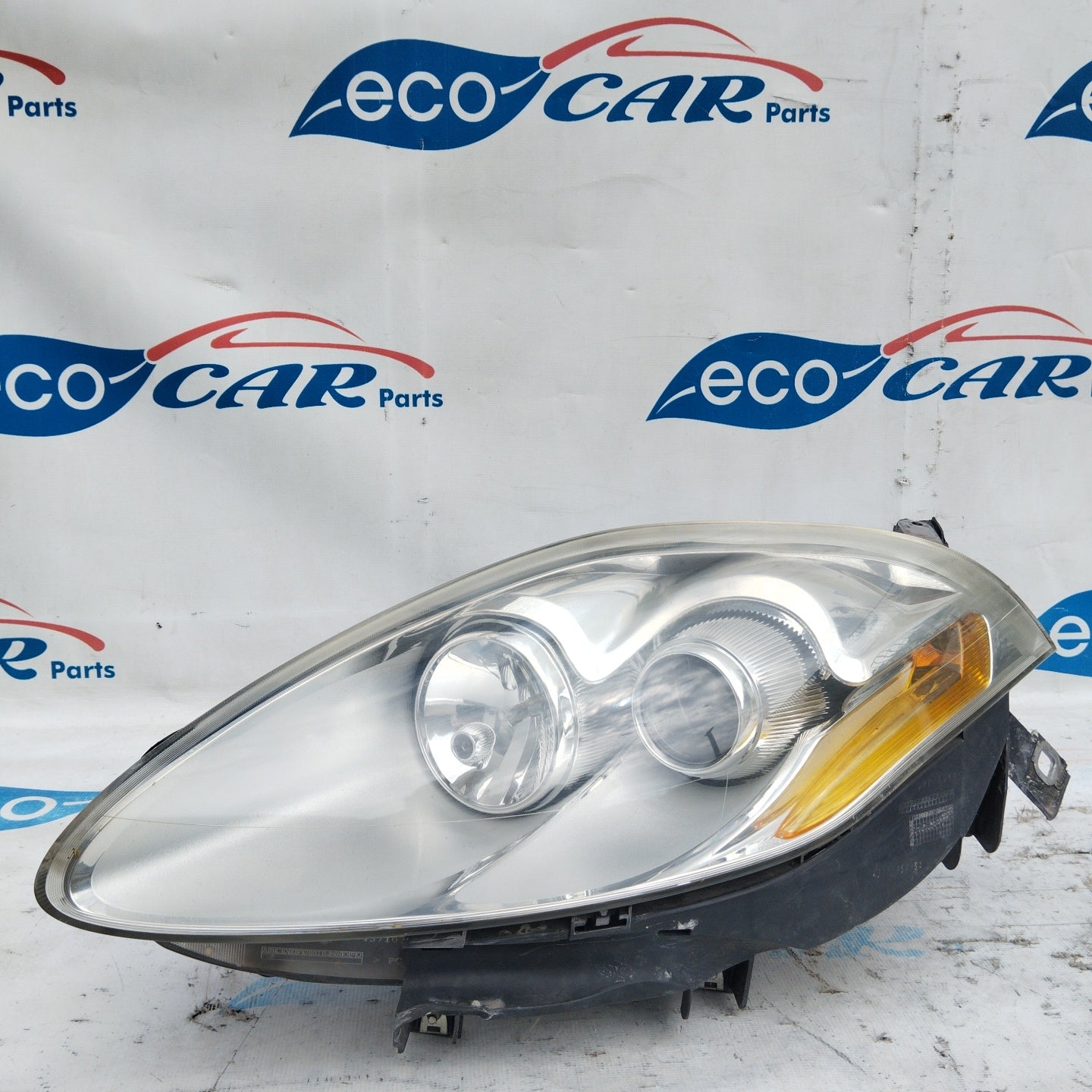Fanale anteriore sx Fiat Bravo 2008 fondo chiaro freccia gialla ecoAG5070