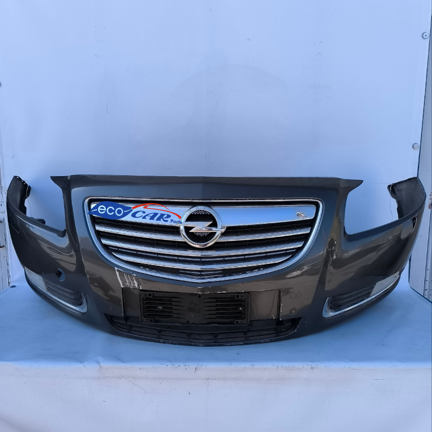 Front bumper Opel Insignia year 2010 gunmetal grey has several deep scratches a crack and a cracked stop ecoAG7082