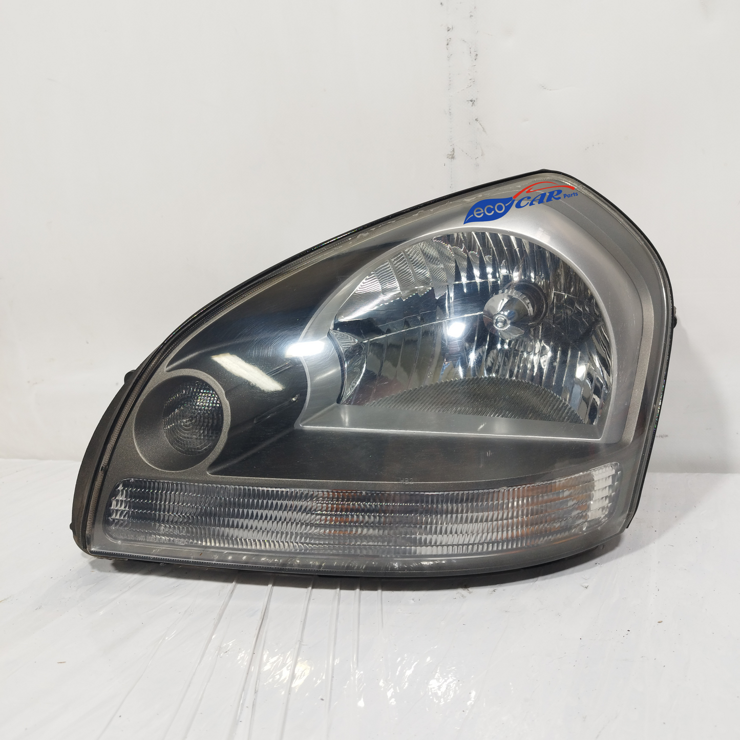 Linker Frontscheinwerfer Hyundai Tucson 2005 Code: 92101-2EXXX ecoAC13295