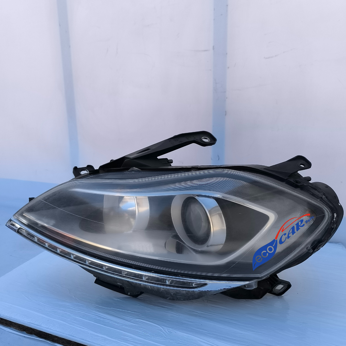 Linker Frontscheinwerfer Lancia Delta Baujahr 2010 (H7) ecoAG7030