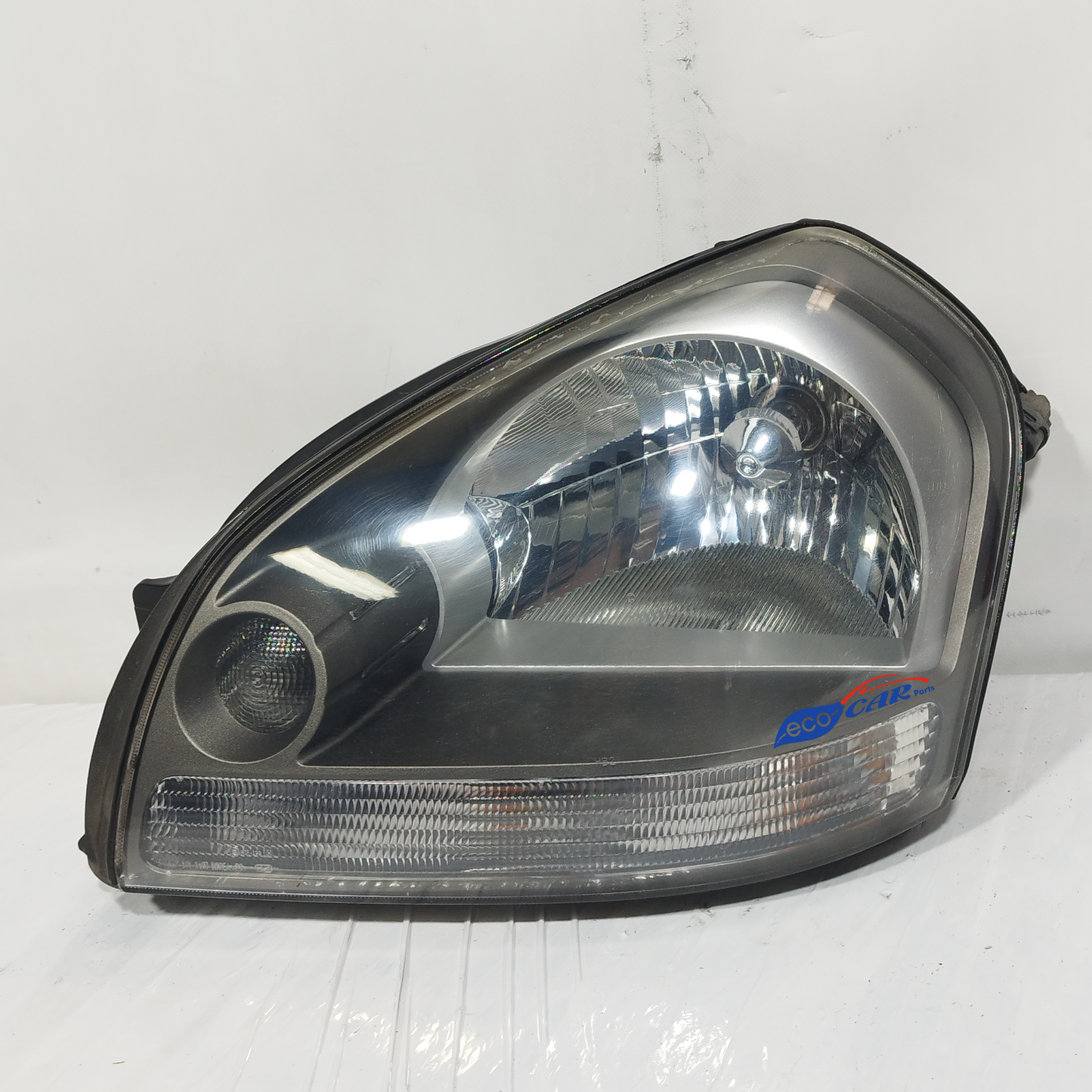 Linker Frontscheinwerfer Hyundai Tucson 2005 Code: 92101-2EXXX ecoAC13295