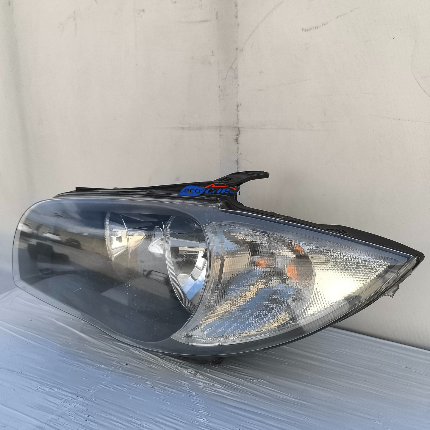 BMW 1er E87 linker Frontscheinwerfer, innen leicht verschmutzt, 1 Clip abgebrochen ecoAG597