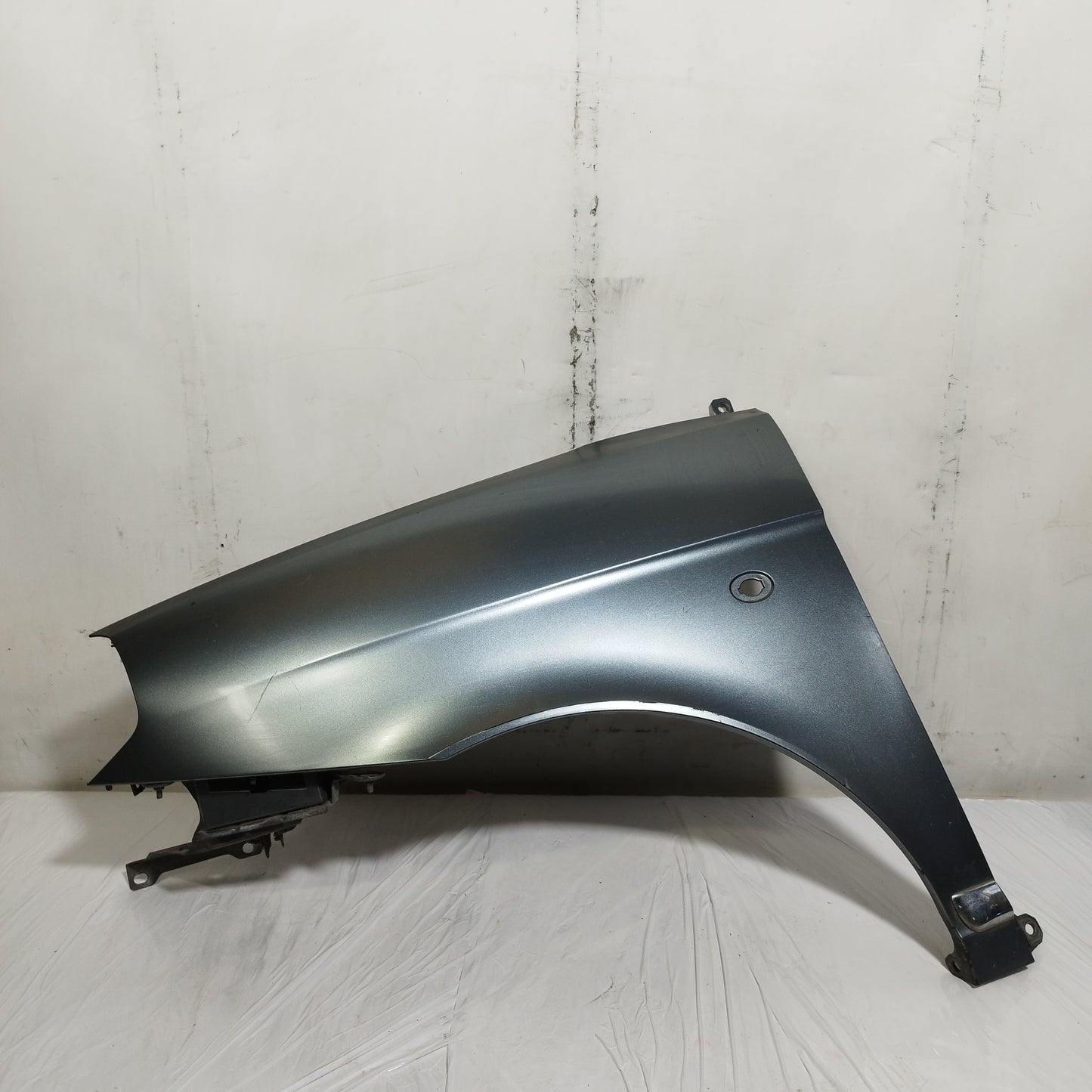 Parafango anteriore sx grigio scuro Lancia Ypsilon (843) II serie 2006-2011 ecoAC16144