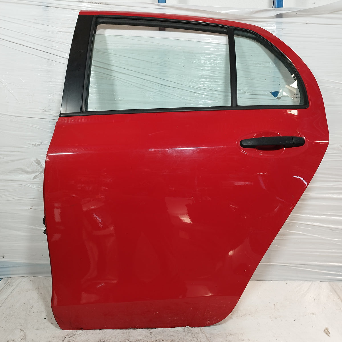Sportello posteriore sx rosso Toyota Yaris II (XP90) 2005-2011 ecoAC16974