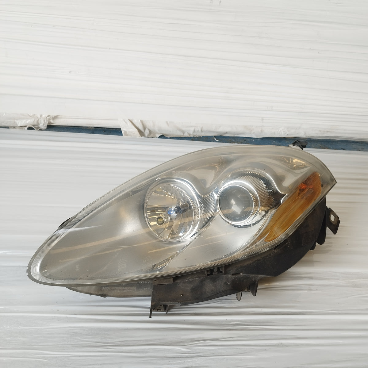 Fanale anteriore sx Fiat Bravo (198) 2007-2010 ecoAC17596