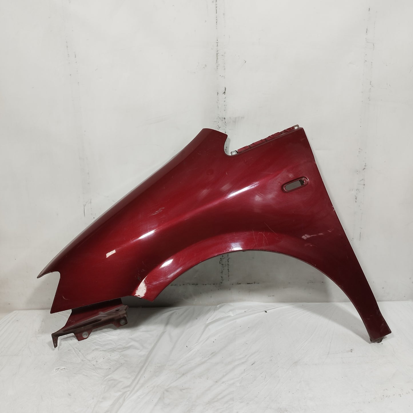 Parafango anteriore sx bordò Fiat Idea 2005-2012 ecoAC16163