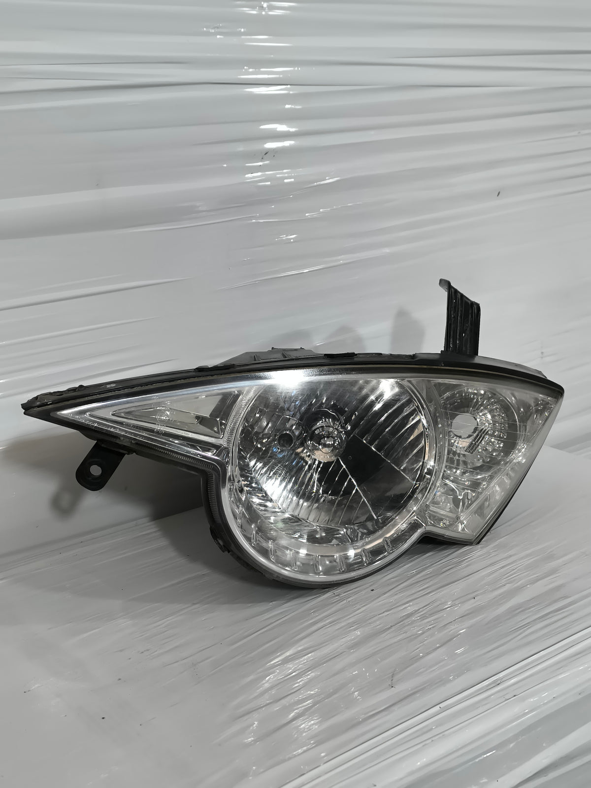 Fanale anteriore sx SsangYong Actyon (CJ) anno 2006-2011 ecoAG9806