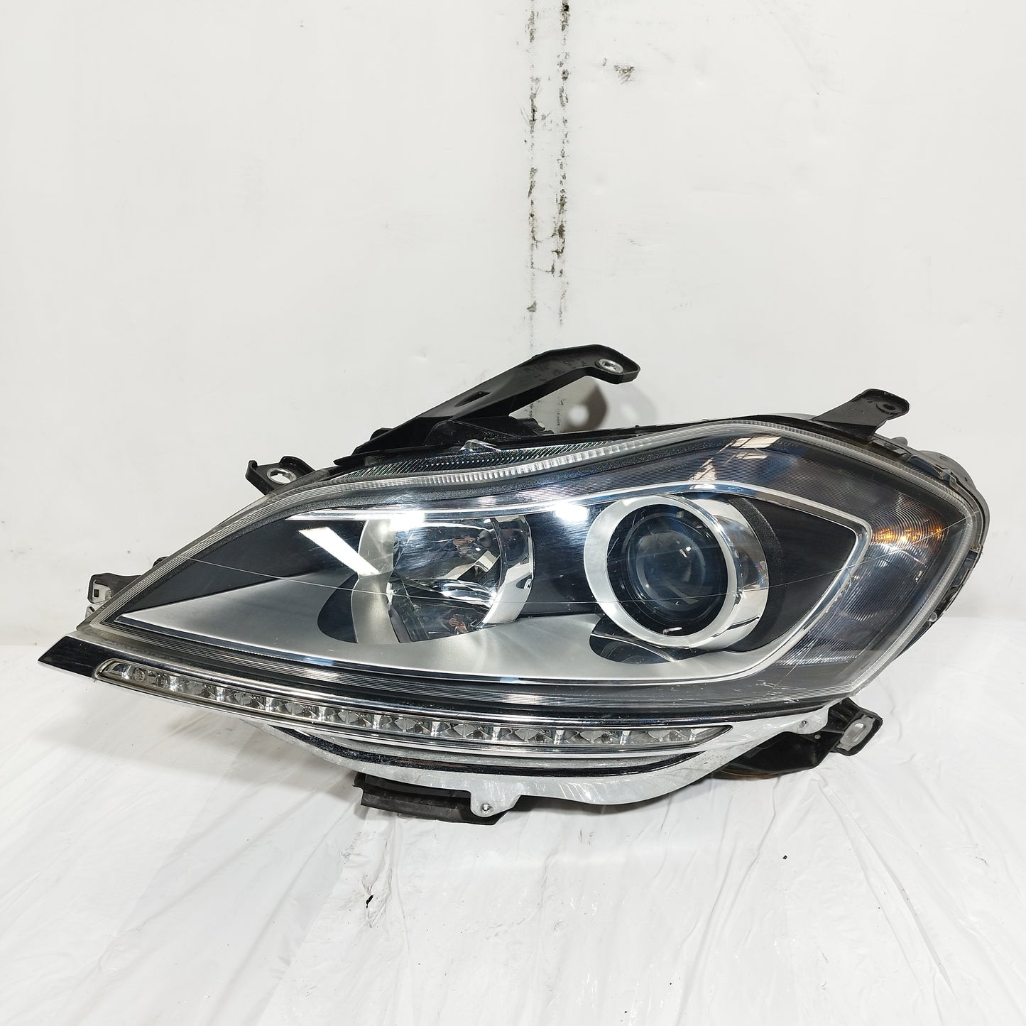 Fanale anteriore sx Lancia Delta III serie (844) 2008-2014 ecoAC15025