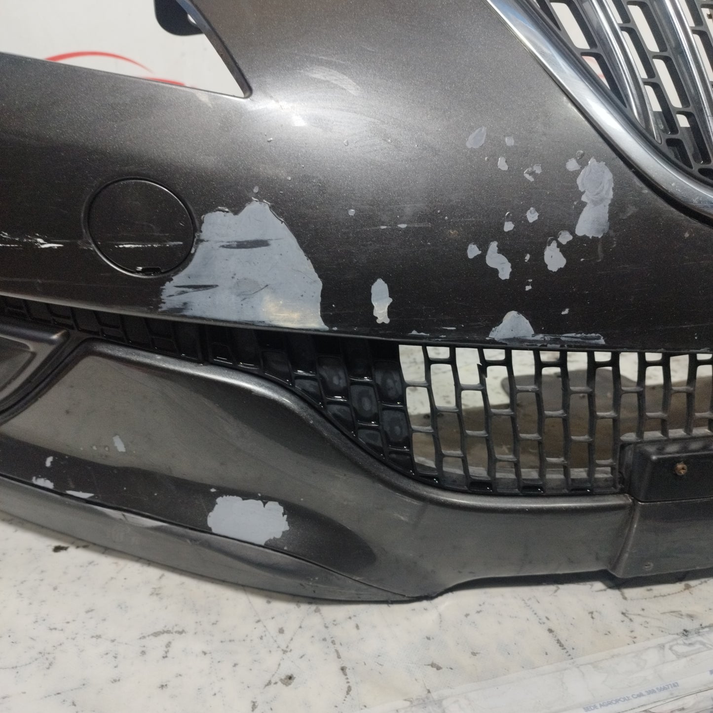 Paraurti anteriore grigio scuro Lancia Delta 2009 ecoAC10222