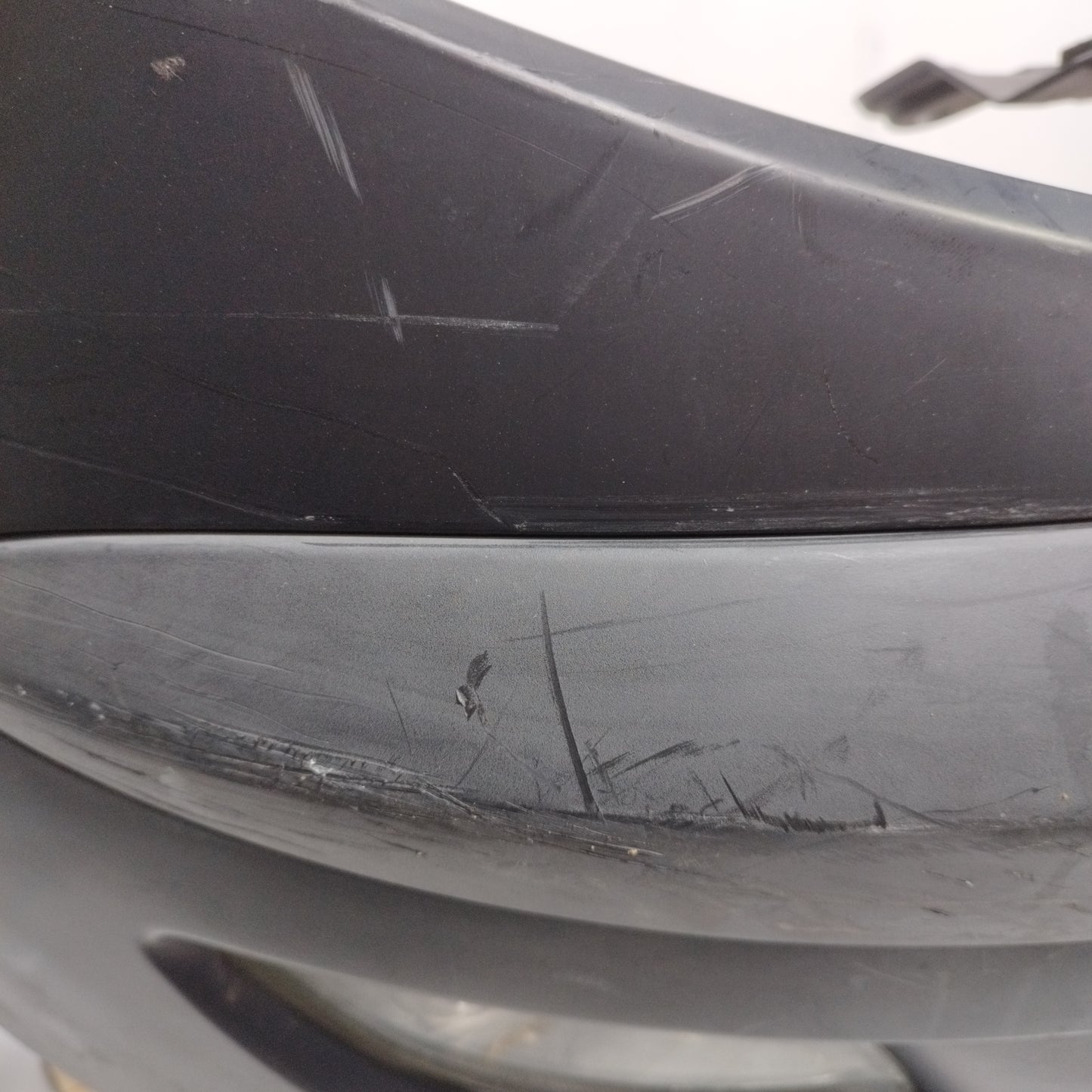 Front bumper black plastic Lancia Ypsilon 2005 ecoAC11901