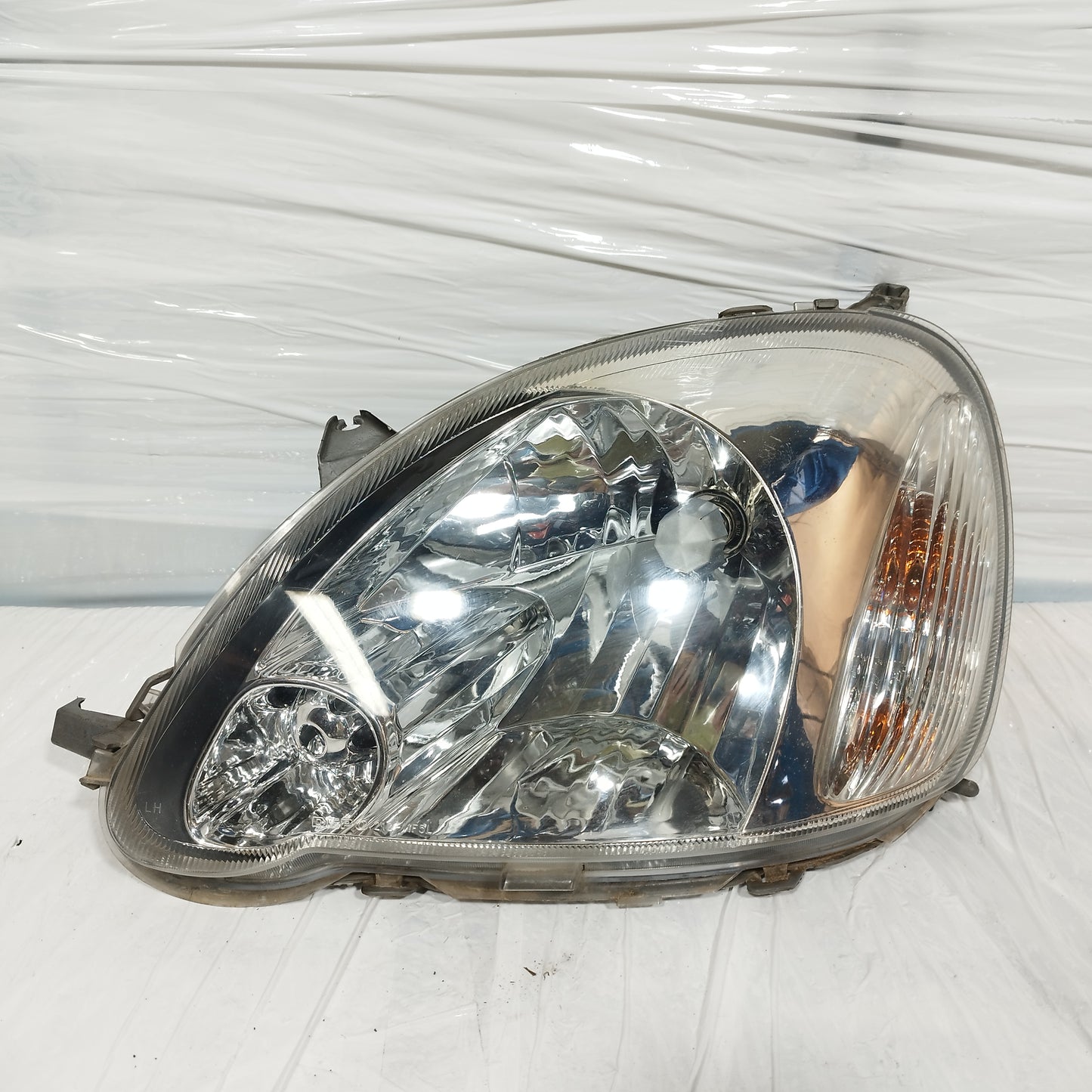 Fanale anteriore sx Toyota Yaris 2003-2005 Restyling DEPO cod: 212-11F5L ecoAC16861
