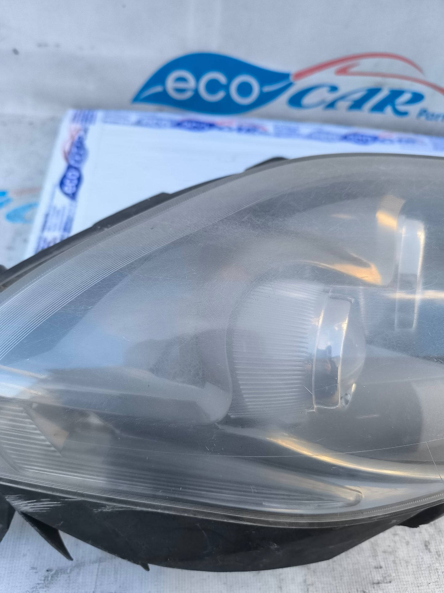 Fanale anteriore dx Fiat Bravo 2008 (fondo scuro freccia bianca) ecoAG6172