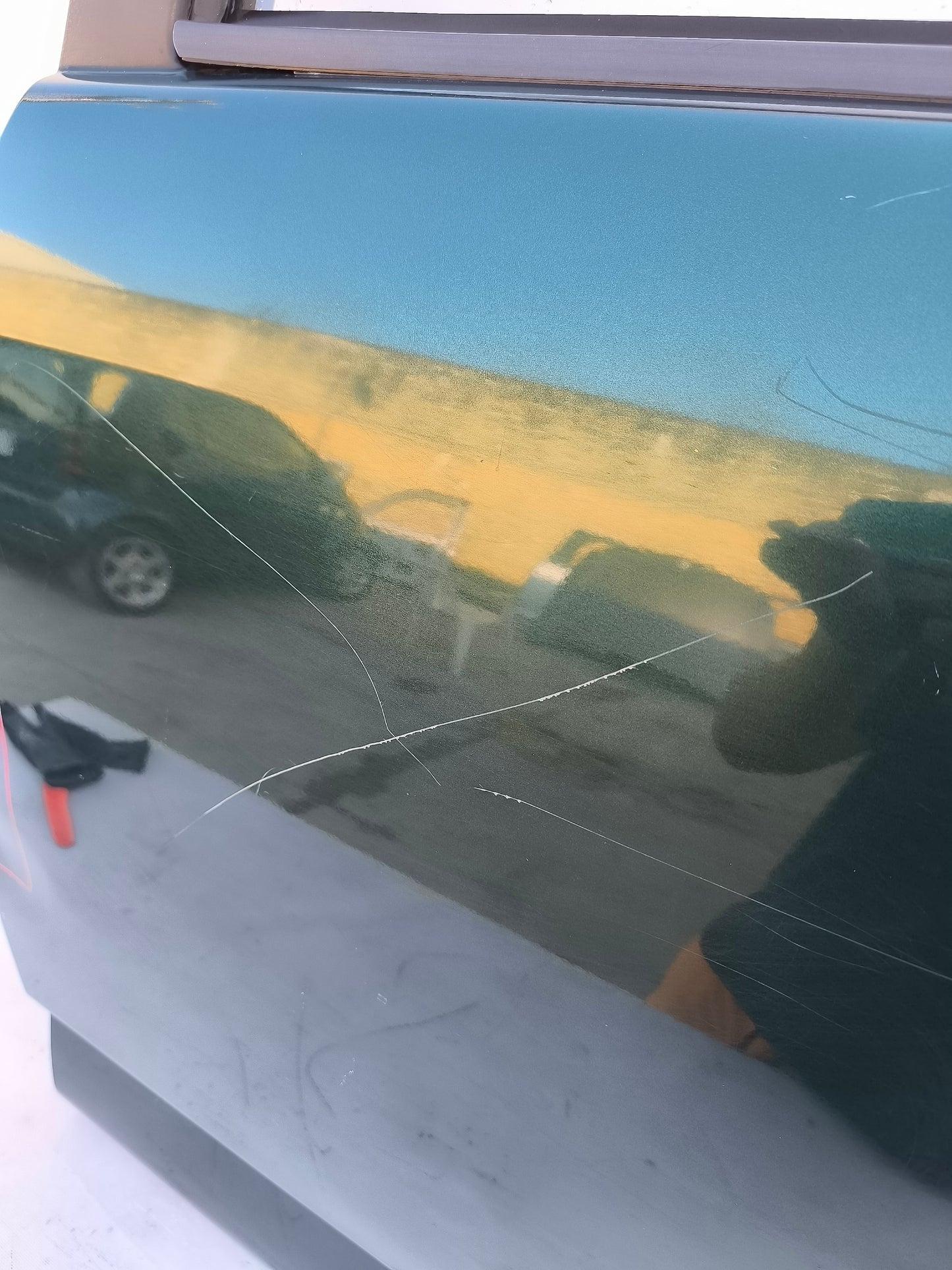 Dark green left rear door Daihatsu Terios year 2010 has scratches and is bumped ecoAG7173