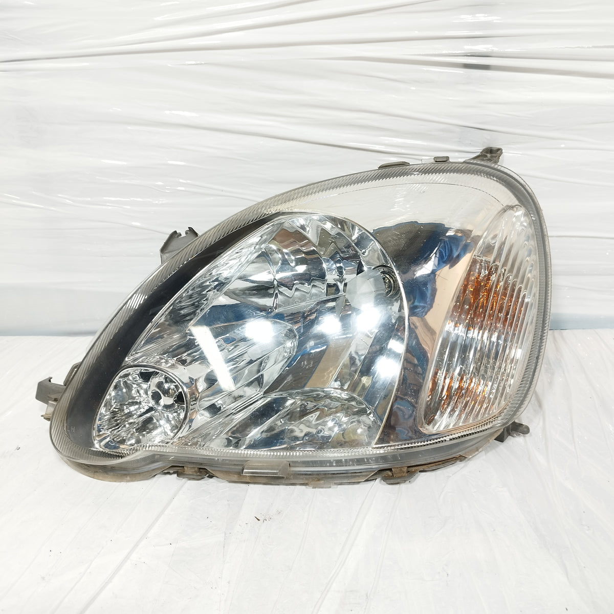 Fanale anteriore sx Toyota Yaris 2003-2005 Restyling DEPO cod: 212-11F5L ecoAC16861